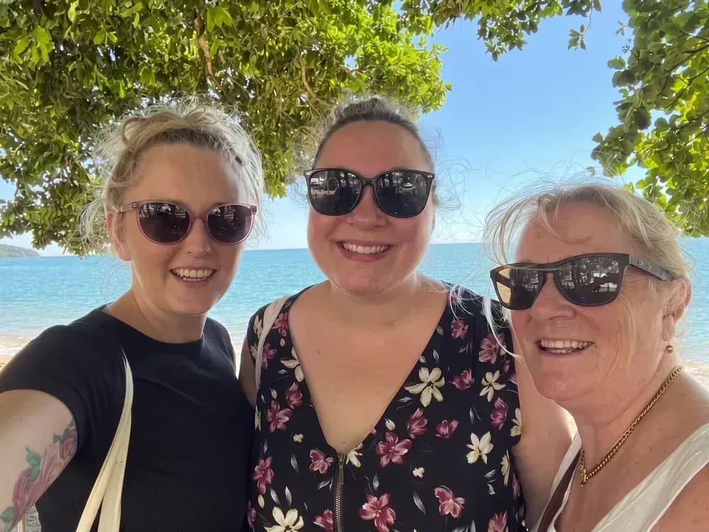 The Nurturing Life Connections team together by the water